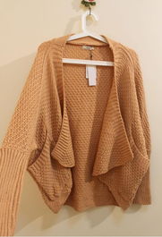 2012冬裝新風(fēng)尚 韓版日系復(fù)古蝙蝠袖針織衫穿搭指南